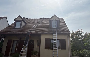 Réparation de lucarnes et gouttières — pavillon