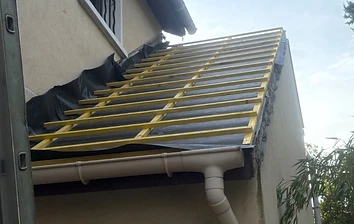 Réfection complète — écran sous-toiture et liteaux neufs