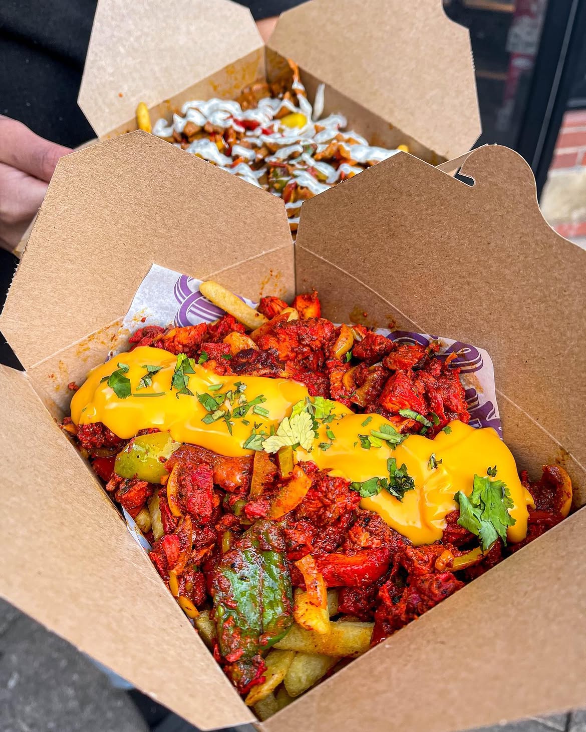 Best loaded fries in Manchester with spiced chicken and nacho cheese