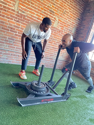 Jabari Washington coaching an athlete