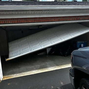 Emergency Off-Track Door Realignment in Albany, NY
