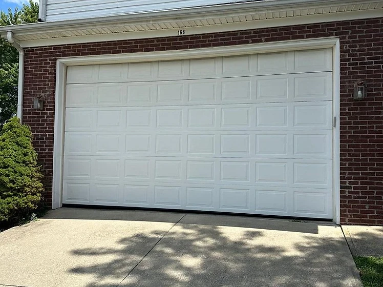 Raised panel garage door installation in Albany NY
