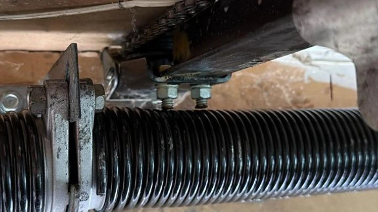 Broken torsion spring emergency repair