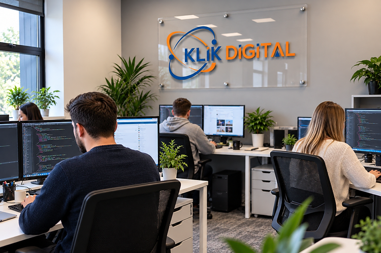 The Klik Digital Marketing office in Rotherham, with the Klik Digital logo mounted on the wall and the team working at their desks