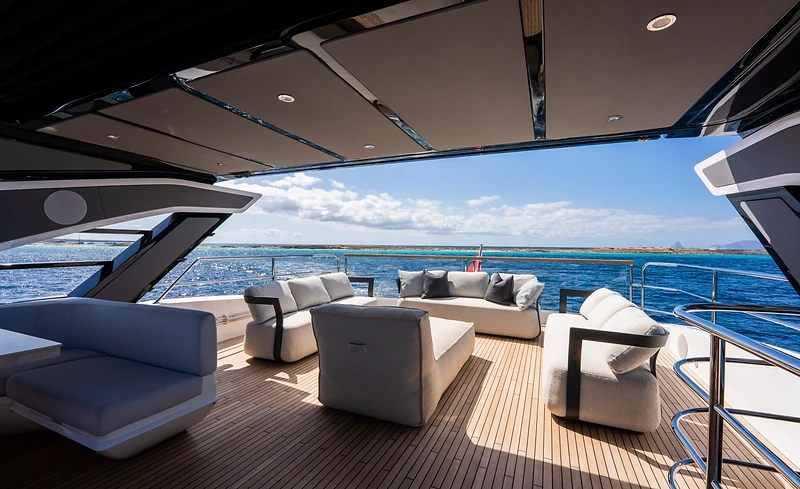 Open-air aft deck lounge overlooking the sea