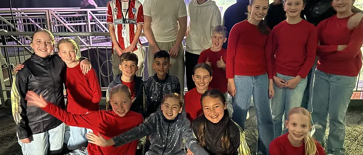 Group of WPS performers at the arena concourse