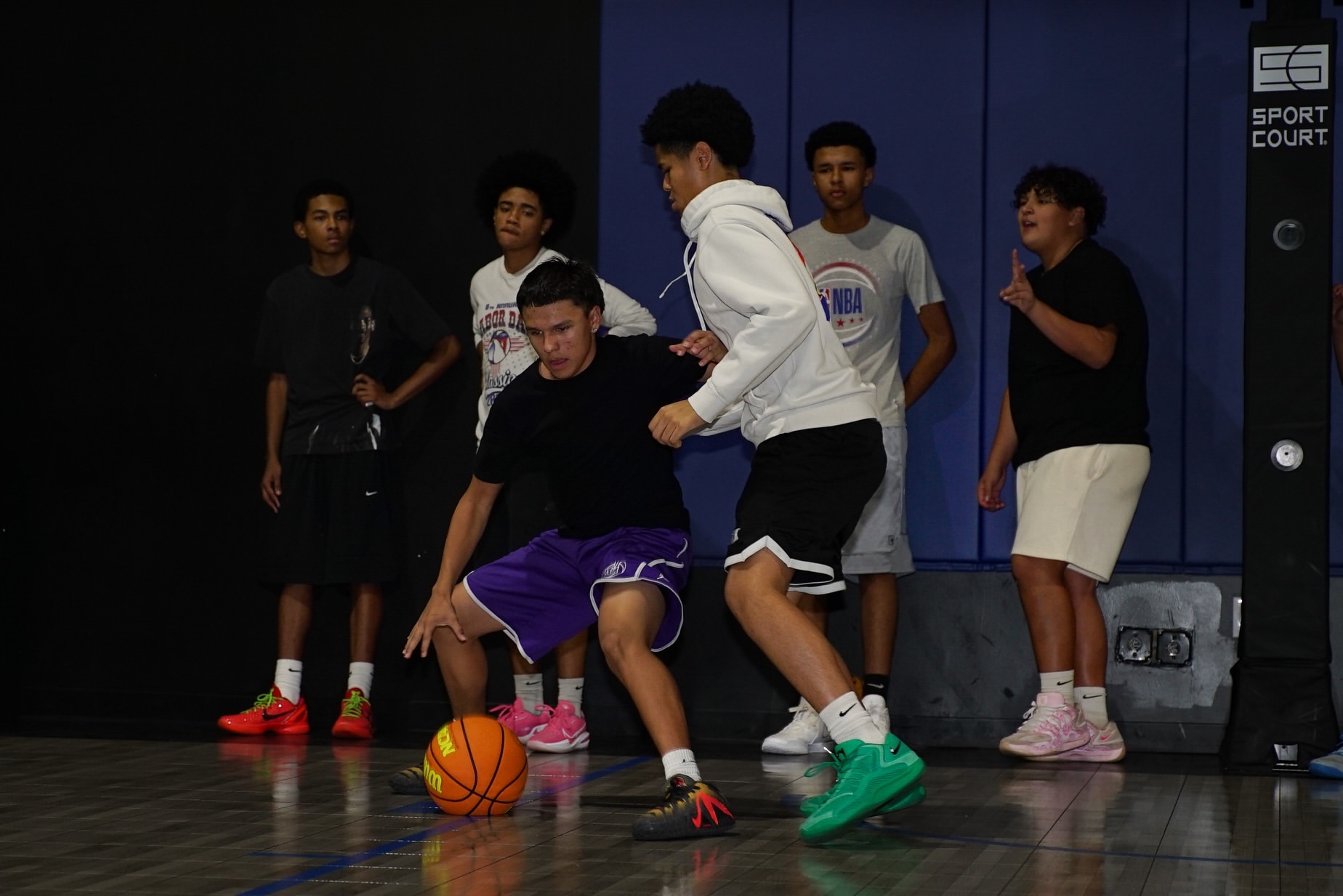 Coach working with Valley Titans players