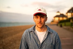 Close-up of Max White on the beach at golden hour