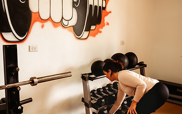 A member training in the Familia Fitness studio