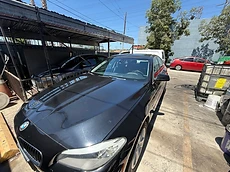 Black BMW sedan polished and clean after detailing by 213 Luis Mobile Detailing