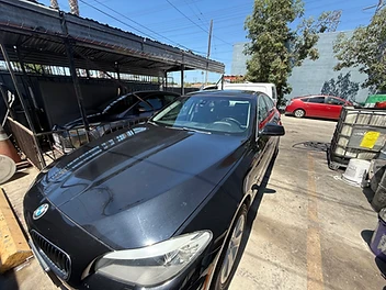 Black BMW sedan polished and clean after detailing by 213 Luis Mobile Detailing
