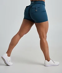 The legs. Quad sweep, hamstrings, calves. The part that gets built, not the part you are born with.