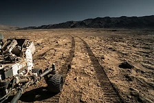 Rover forward view across a martian plain