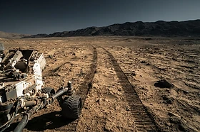 Rover forward camera across a martian plain
