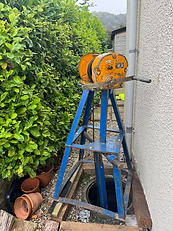OLEX Drainage specialist tripod and winch equipment over an access point