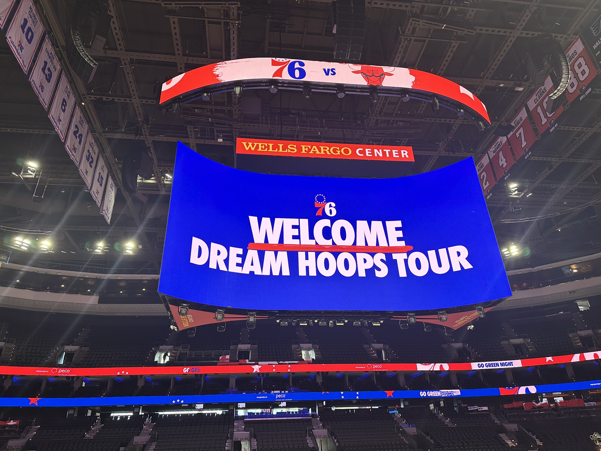 Wells Fargo Center arena scoreboard welcoming Dream Hoops Tour