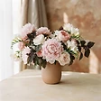 Flower Bomb base notes — Patchouli · Musk · Peony