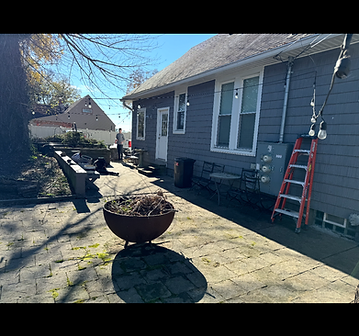 Same patio cleared and swept after cleanup