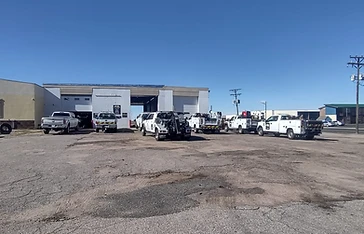 MTG Shops Brush, Colorado repair shop with service trucks and wreckers parked out front
