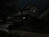 Dark, poorly lit photo of a house
