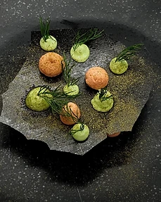 Signature dish on black slate