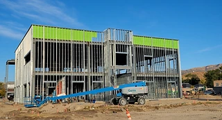 Multi-story commercial exterior metal stud framing with sheathing