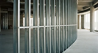Curved architectural metal stud framing