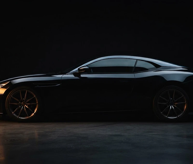 Premium vehicle in dramatic studio light