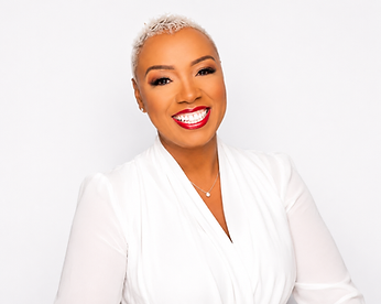 Dr. Maricia Sherman headshot in white blouse