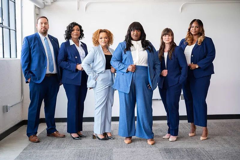 Sara Williams law firm team — group portrait of attorneys and legal staff at the Singleton Schreiber Birmingham, Alabama office