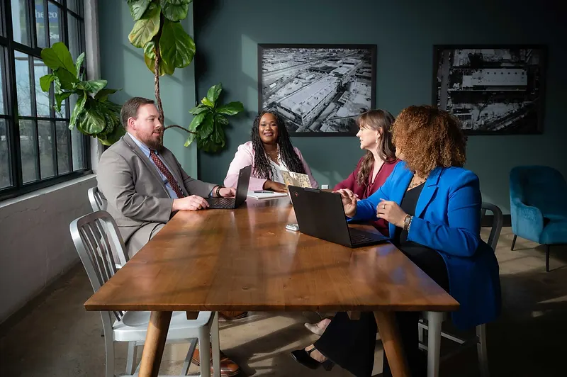 Sara Williams legal team working together on personal injury and wrongful death cases at a collaborative meeting in Birmingham, Alabama