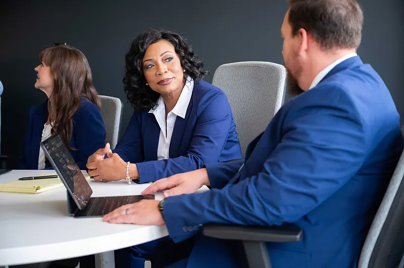 Sara Williams legal team collaborating during a case strategy meeting at the firm's Birmingham, Alabama law office