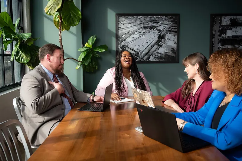 Sara Williams law firm partners in a collaborative strategy session for personal injury and catastrophic injury cases in Birmingham