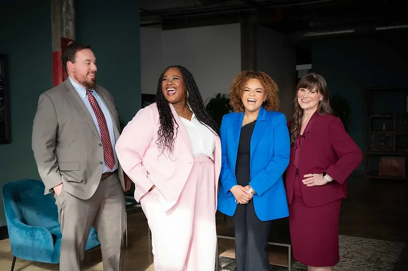 Sara Williams attorneys in a candid team moment at the firm's Birmingham, Alabama law office