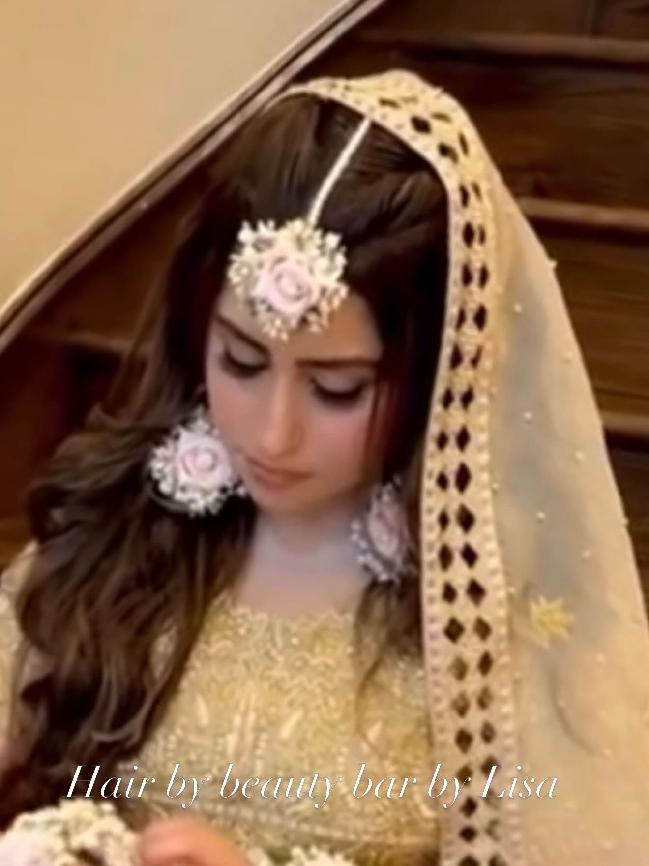 Bridal soft waves with maang tikka and floral drop earrings