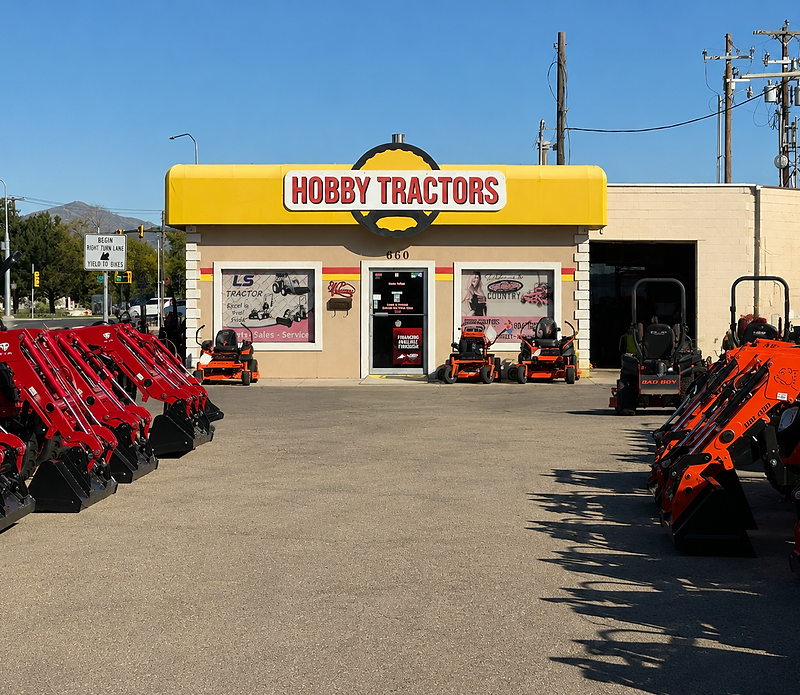 Hobby Tractors storefront with tractors and mowers on the lot