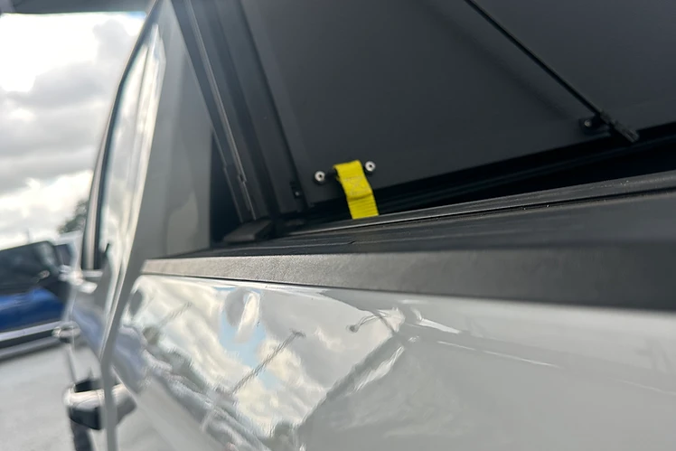 Silver Pickup Driver-Side Panel Ding - before