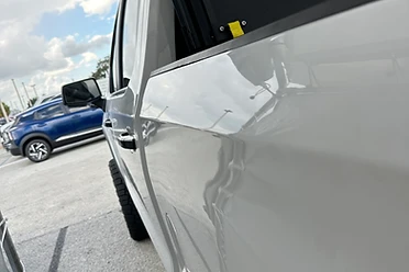 Silver Pickup Truck — Door Ding before and after paintless dent repair by Pete's Dent Repair - after
