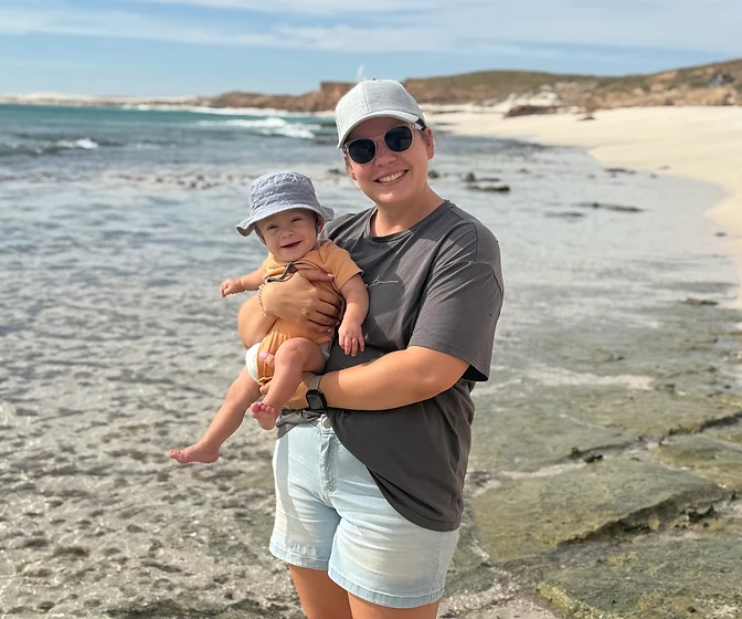 A mother and baby at a Western Australian beach