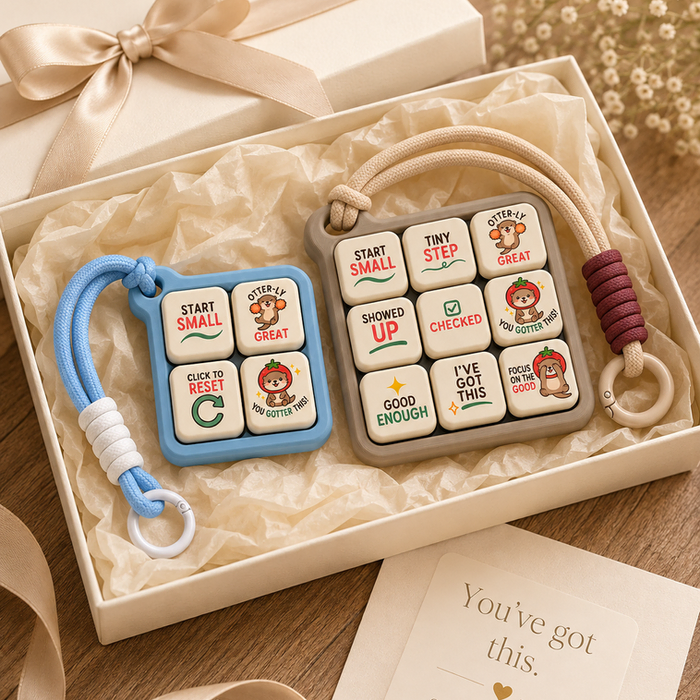 Tiny Wins Clicker flatlay with planner and stationery