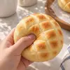 Crunchy Bolo Bun — soft squeeze in hand