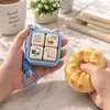 Little Big Things Duo — holding the Clicker while squeezing the squishy