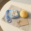 Little Big Things Duo — flat lay with Crunchy Bolo Bun and gift card