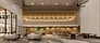 Lobby lounge and bar at The Asteriaz with champagne-gold pendant