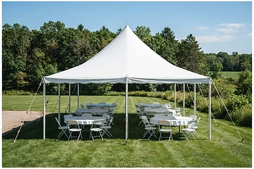 Graduation party setup under a white tent