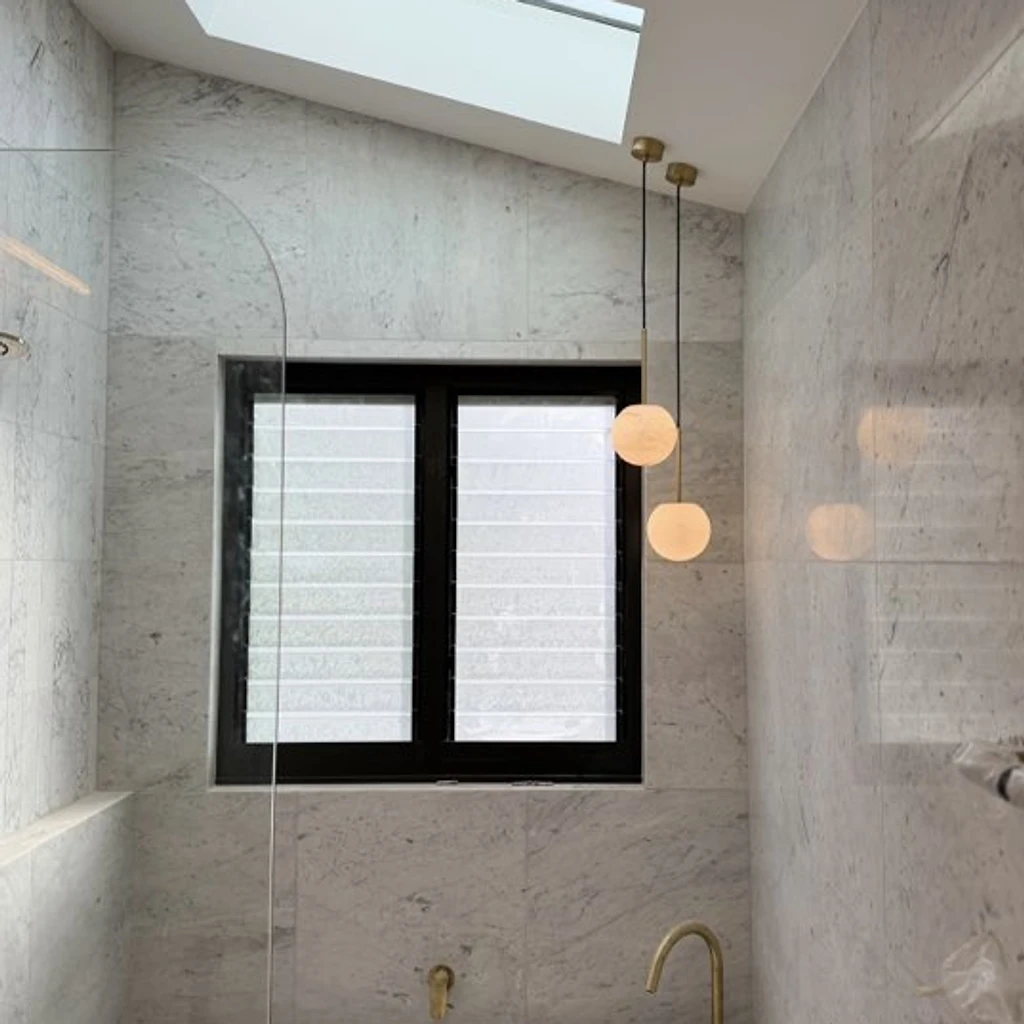 Feature pendant lighting in a renovated Sydney bathroom