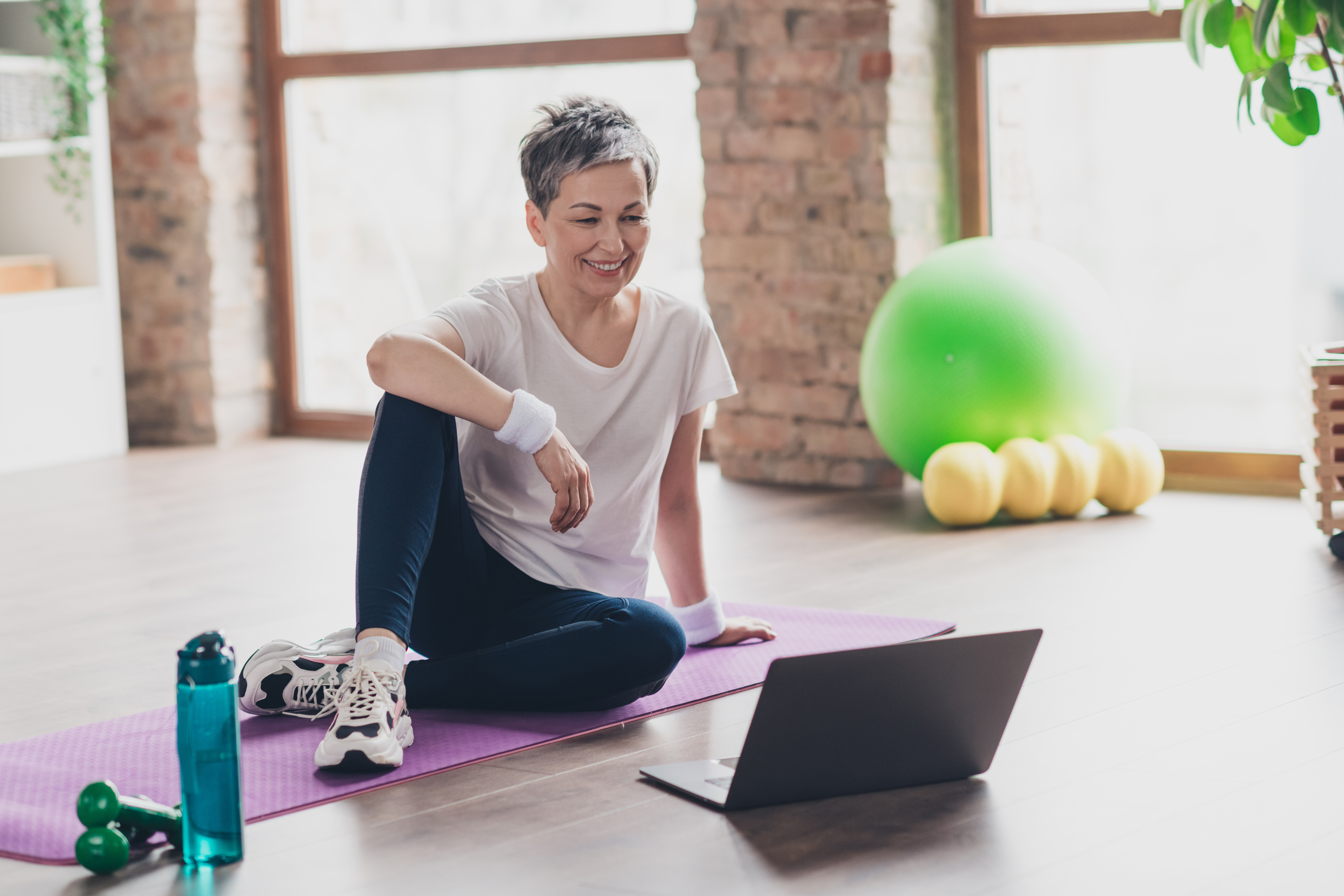 Adult following a personalized at-home workout