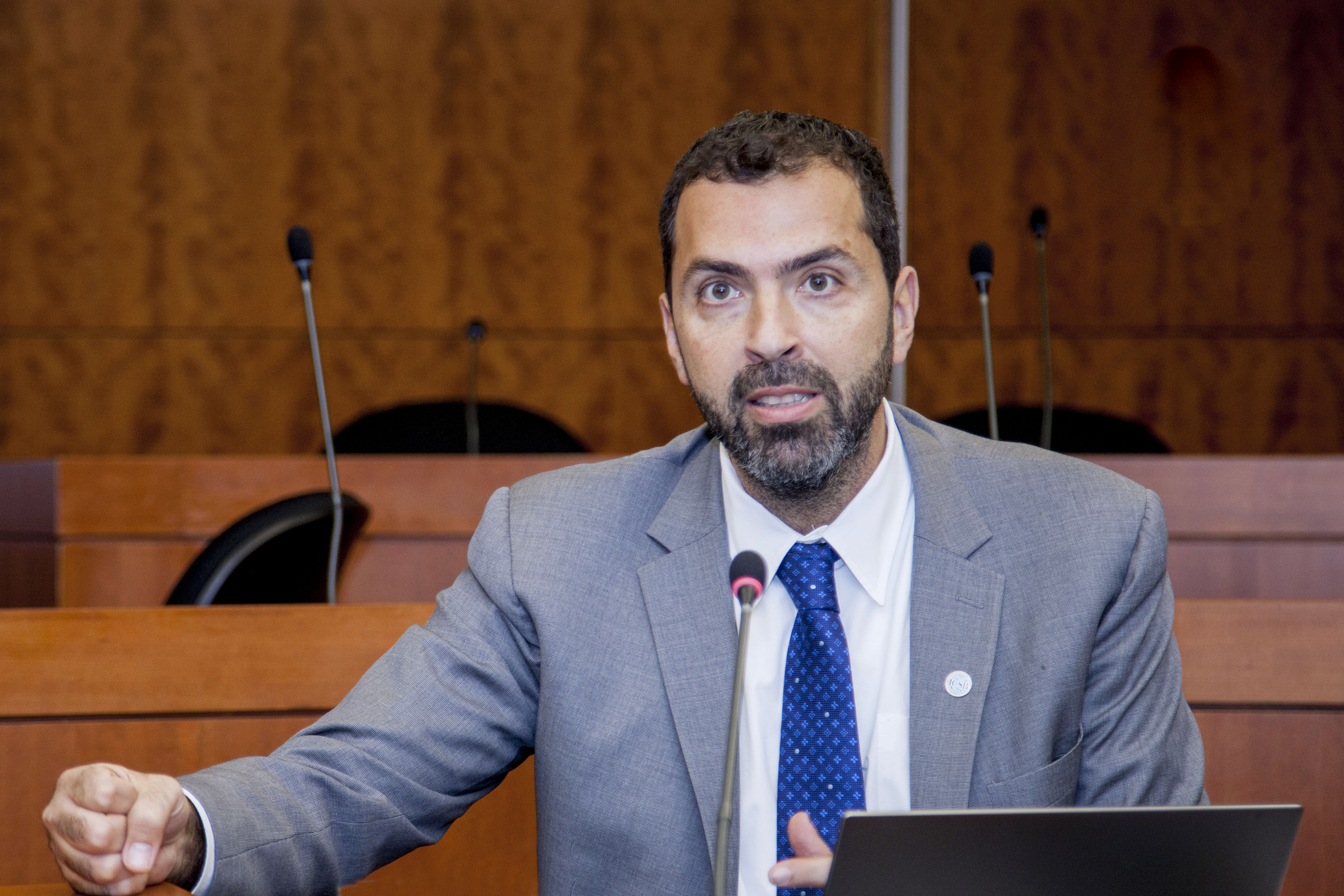 Ayman El Tarabishy speaking at a podium in his Etoday column 'The Measure of Nations'