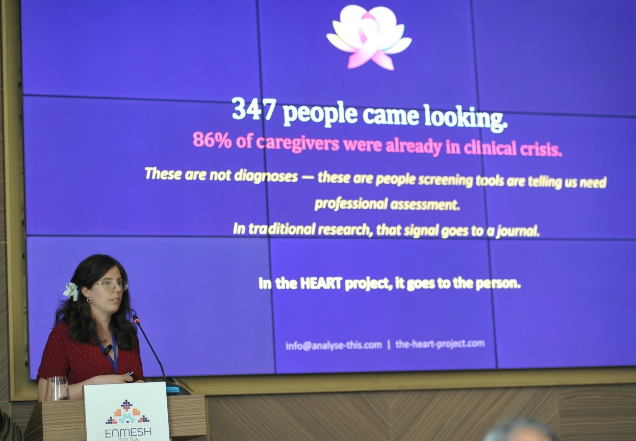 Presenting the HEART project at ENMESH 2026: 347 people came looking, and 86% of caregivers were already in clinical crisis.