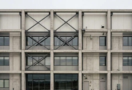 Industrial facility facade with concrete and steel structure